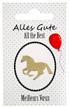 Przypinka w kształcie konia w ozdobnym opakowaniu